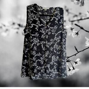 Fever small sleeveless black and white floral polyester woman's blouse.